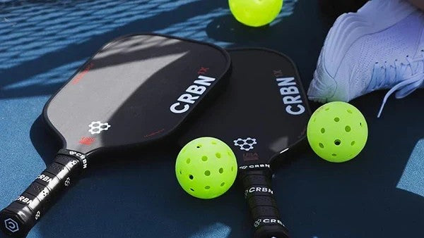 Pickleball paddles and balls