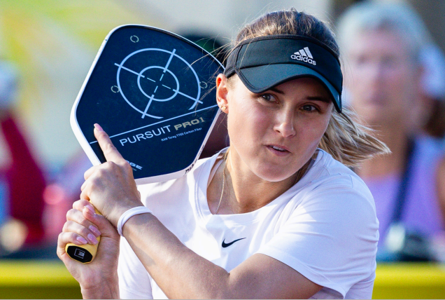 Pro pickleball player Yana Newell with a Pursuit Pro1 paddle