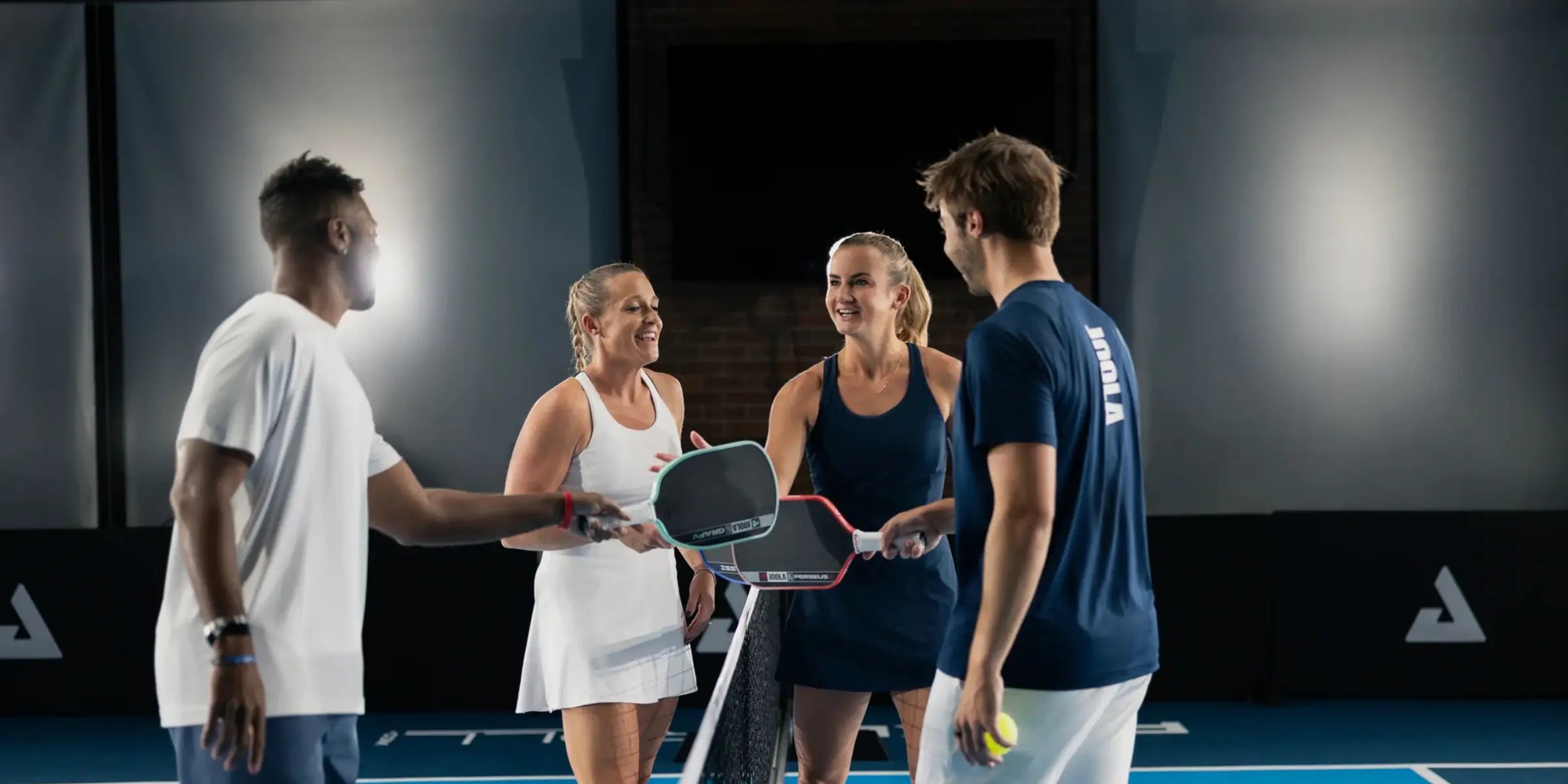 Pickleball players holding paddles at a court — Pickleball Express homepage hero
